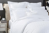 Bed linen, bath and deck towels by Frette